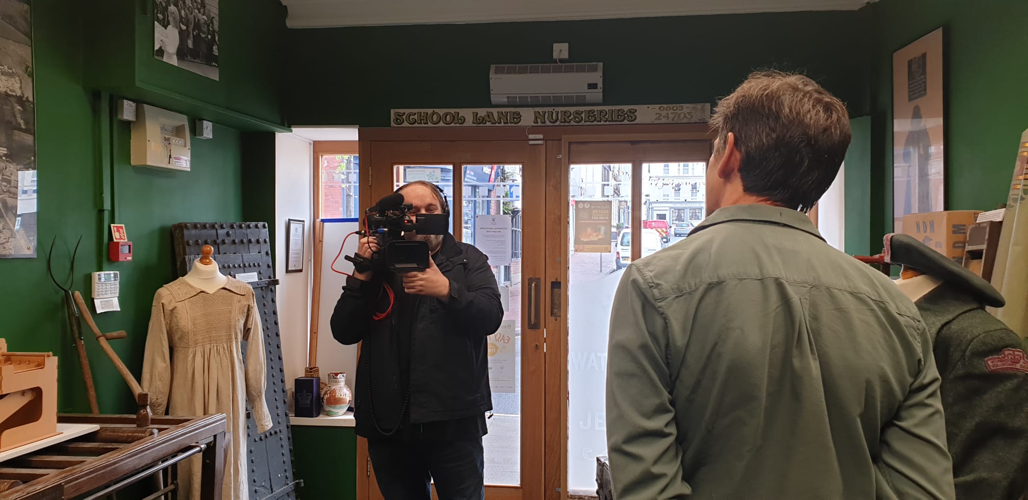 Katie Collins takes a behind the scenes snap of the filming at the Torrington Museum for RBTV. Michael Collins (Video Journalist) Filming Interview with David Gibbons, Chair of Trustees @ Torrington Museum