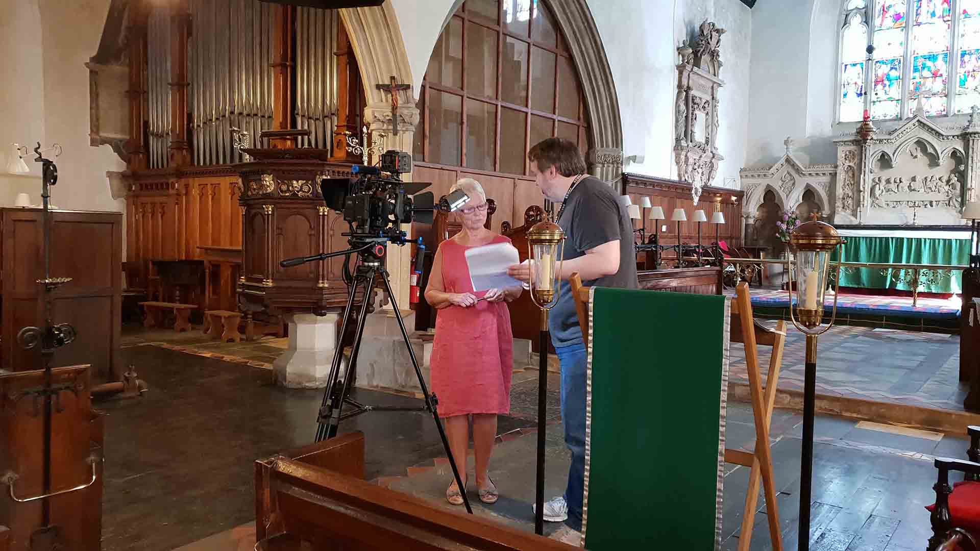 Michael and Katie Collins Filming in a Church in Great Torrington, North Devon, for the Torrington Music, Arts, and Heritage Festival, North Devon